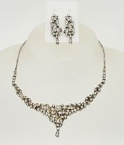 Antique white gold necklace & earrings with diamonds.