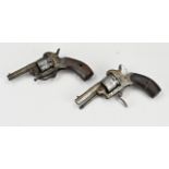 Two antique revolvers