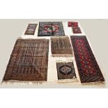 8x Various Persian rugs