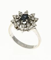 White gold ring with diamond and sapphire