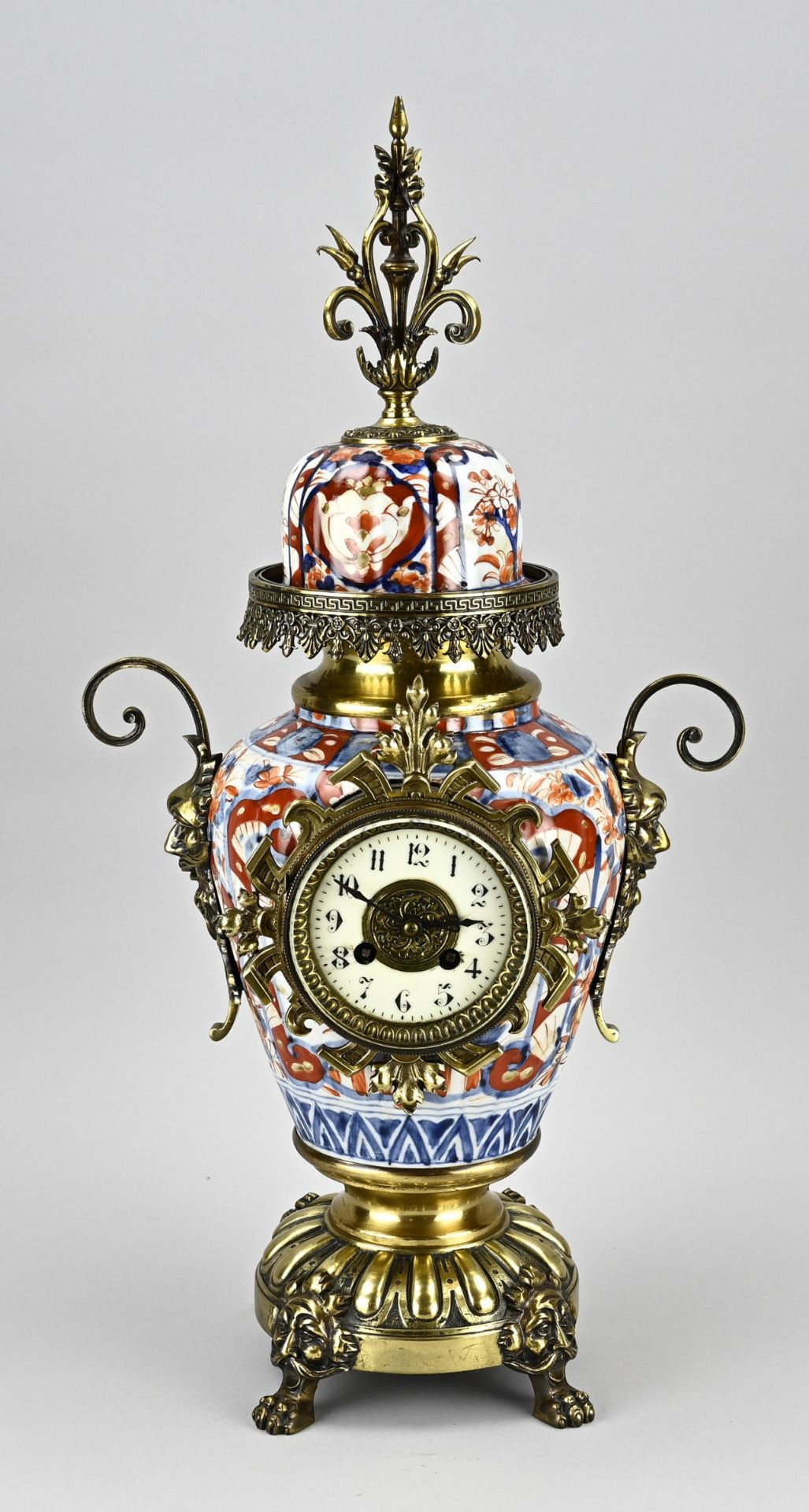 French mantel clock with Imari porcelain, H 59 cm.