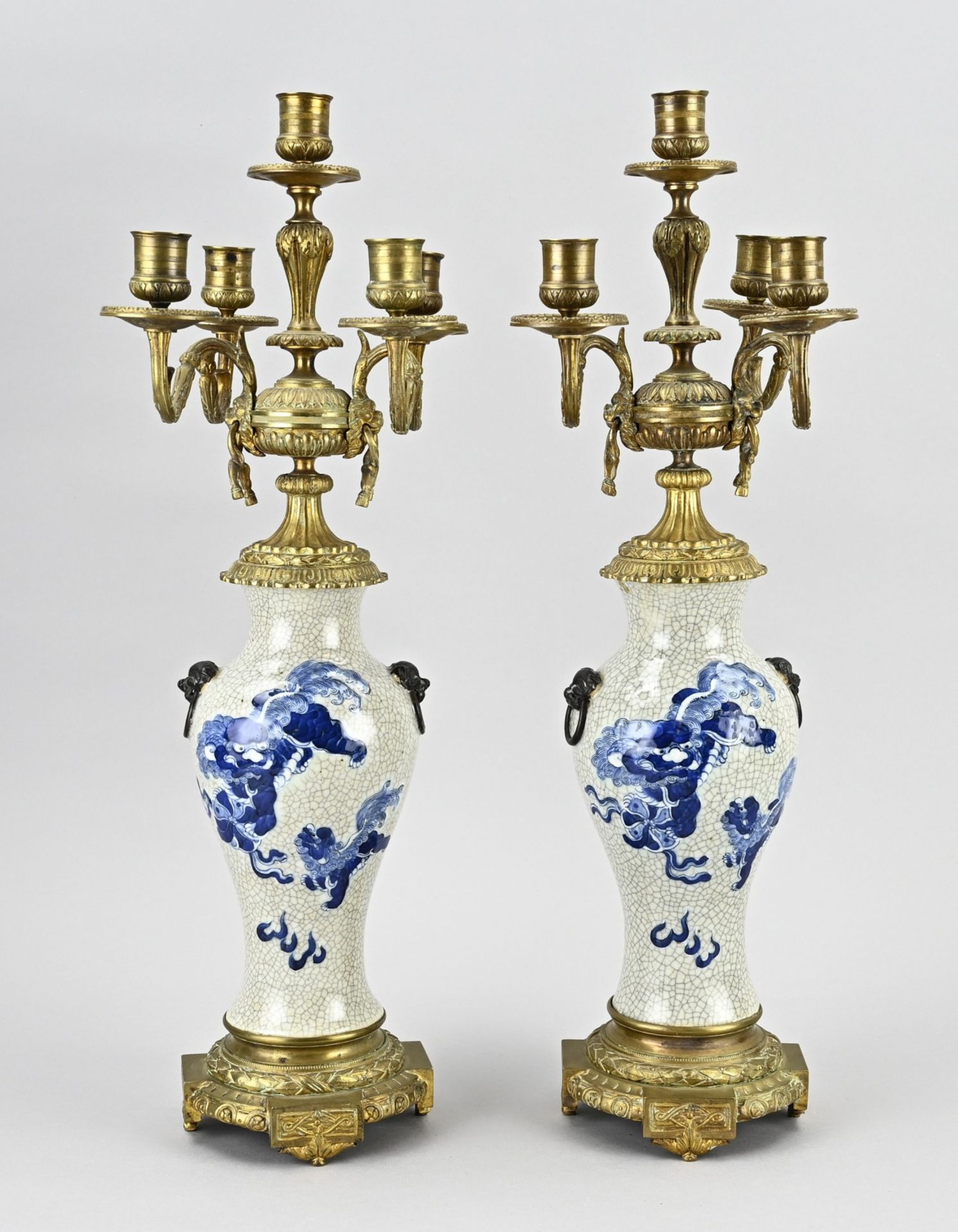 Set of candlesticks with bronze, H 57 cm.