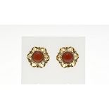 Gold stud earrings in red coral