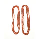 2 strands of red coral
