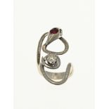 White gold snake ring with ruby and diamond.