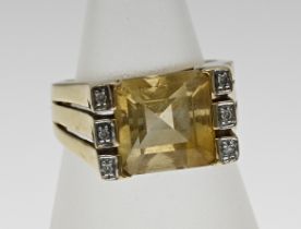 Yellow gold ring with topaz