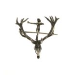 Silver brooch with antlers