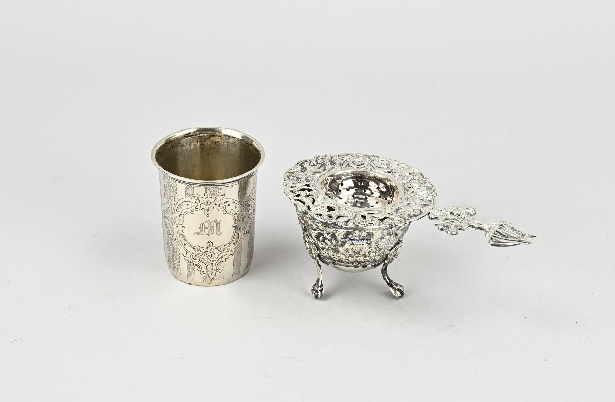 Silver tea strainer, drip tray and cup