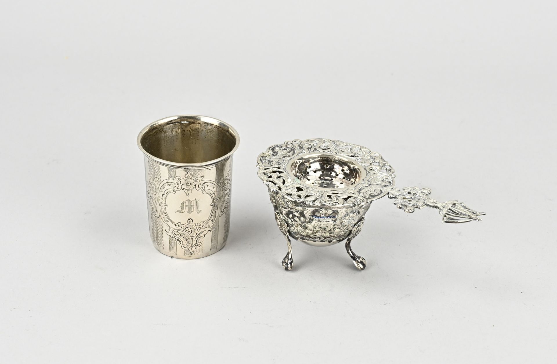 Silver tea strainer, drip tray and cup