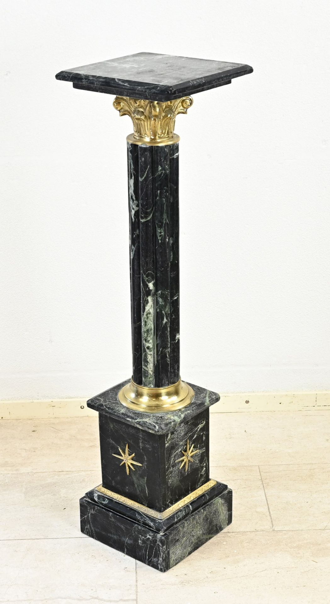 Marble column with bronze