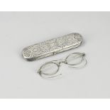 Silver glasses case with glasses