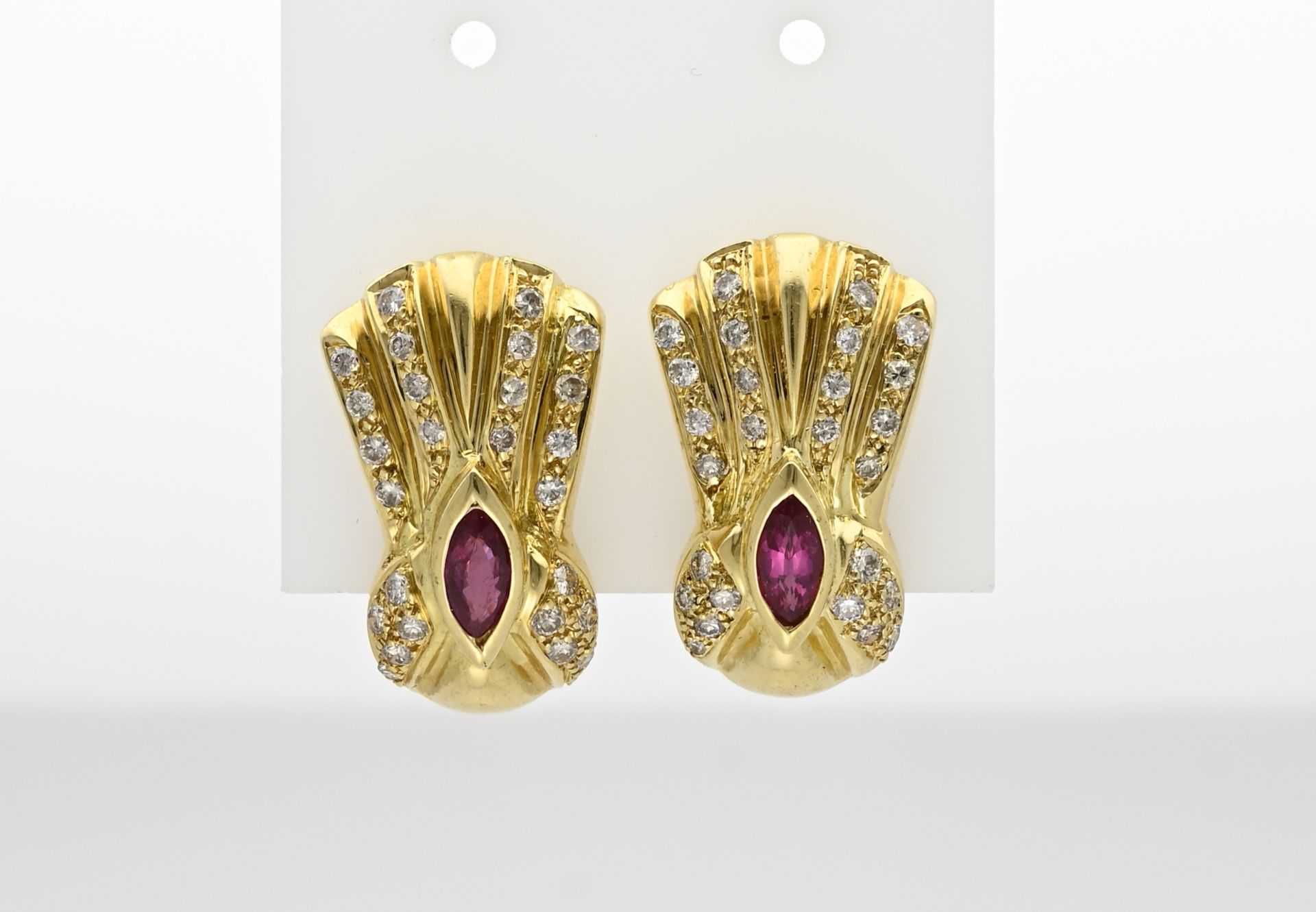 Gold ear studs with diamond and ruby