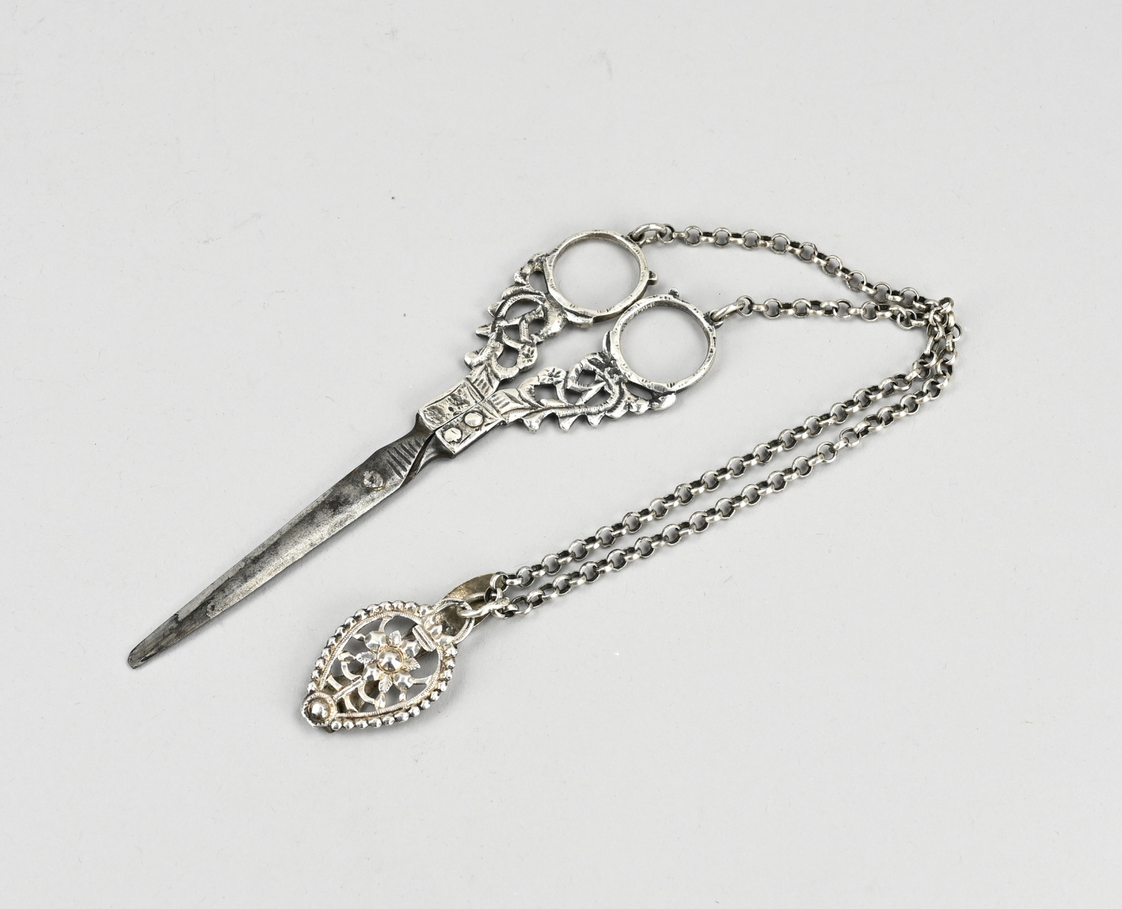 Silver chain with skirt hook etc.