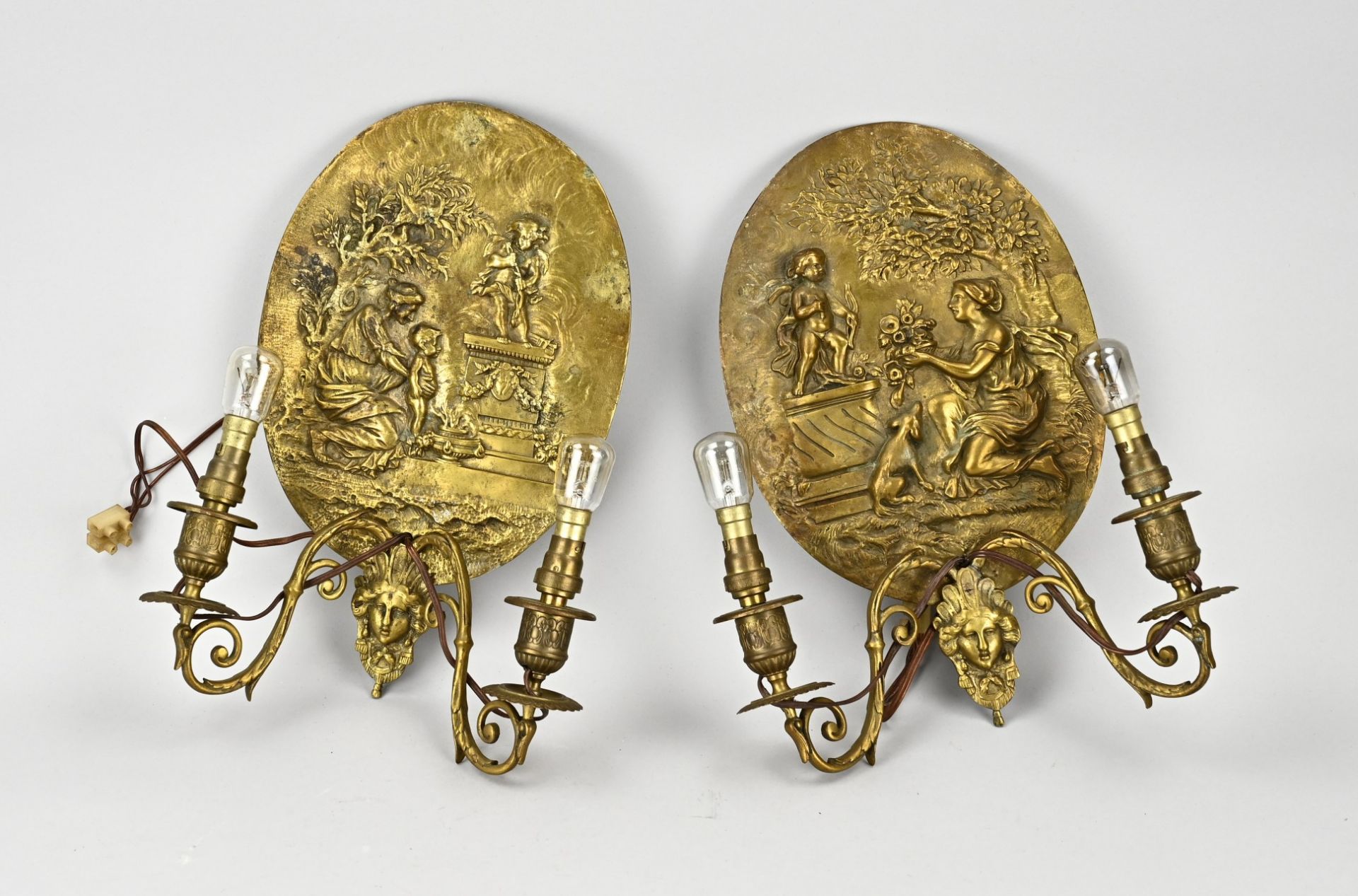 Two bronze wall lamps, 1900