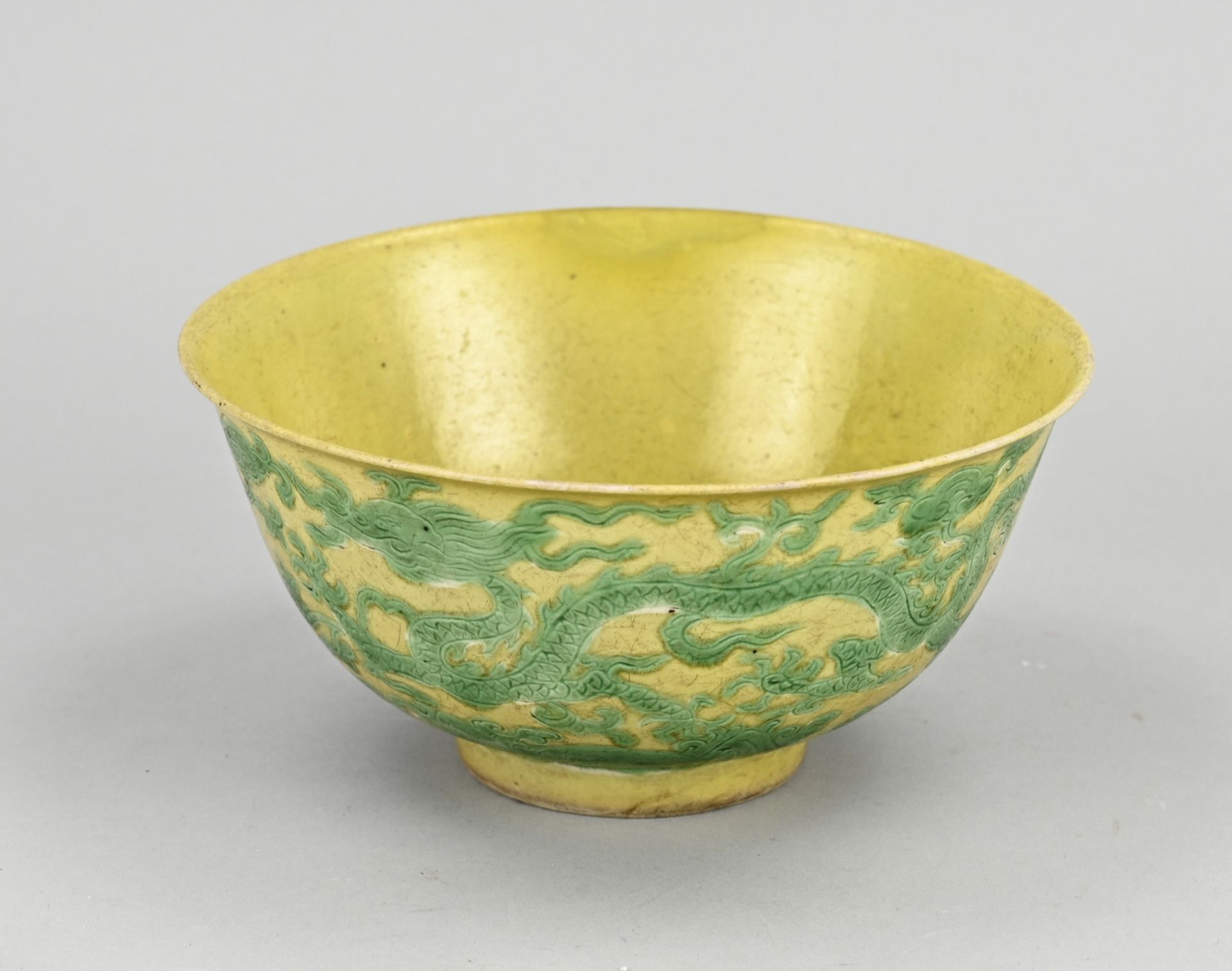 Chinese yellow bowl with green dragon