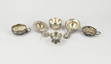 Lot of silver tea strainers and drip trays