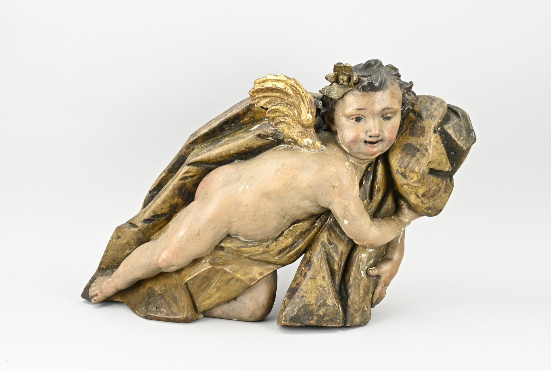 Wood-carved putti