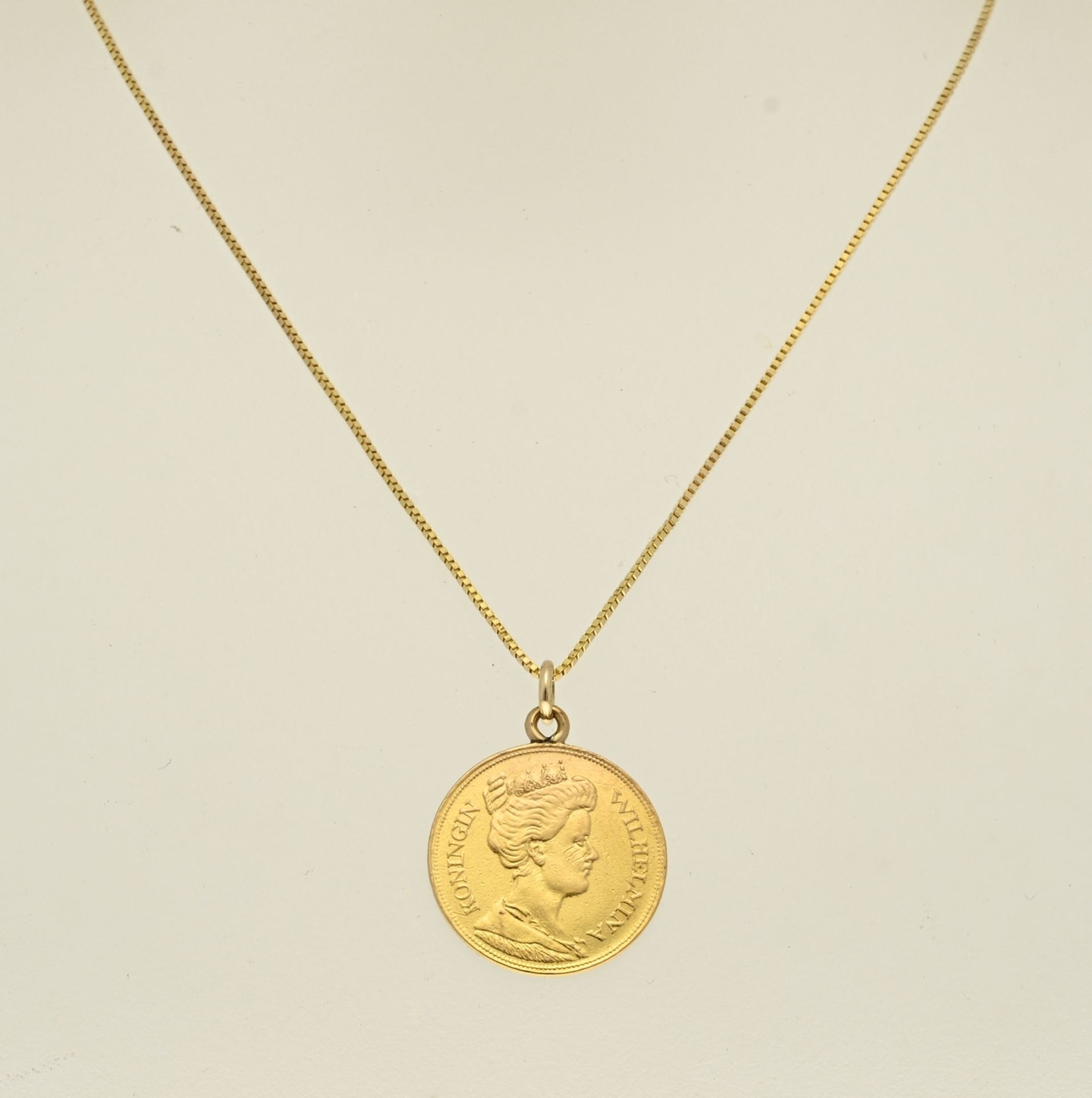 Golden fiver with necklace