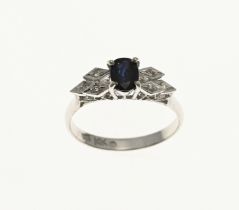 White gold ring with sapphire and diamond