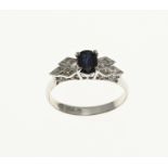 White gold ring with sapphire and diamond