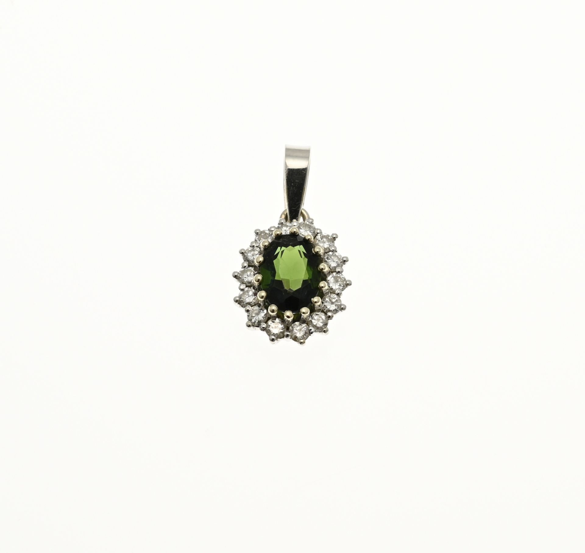 White gold pendant with diamond and green stone