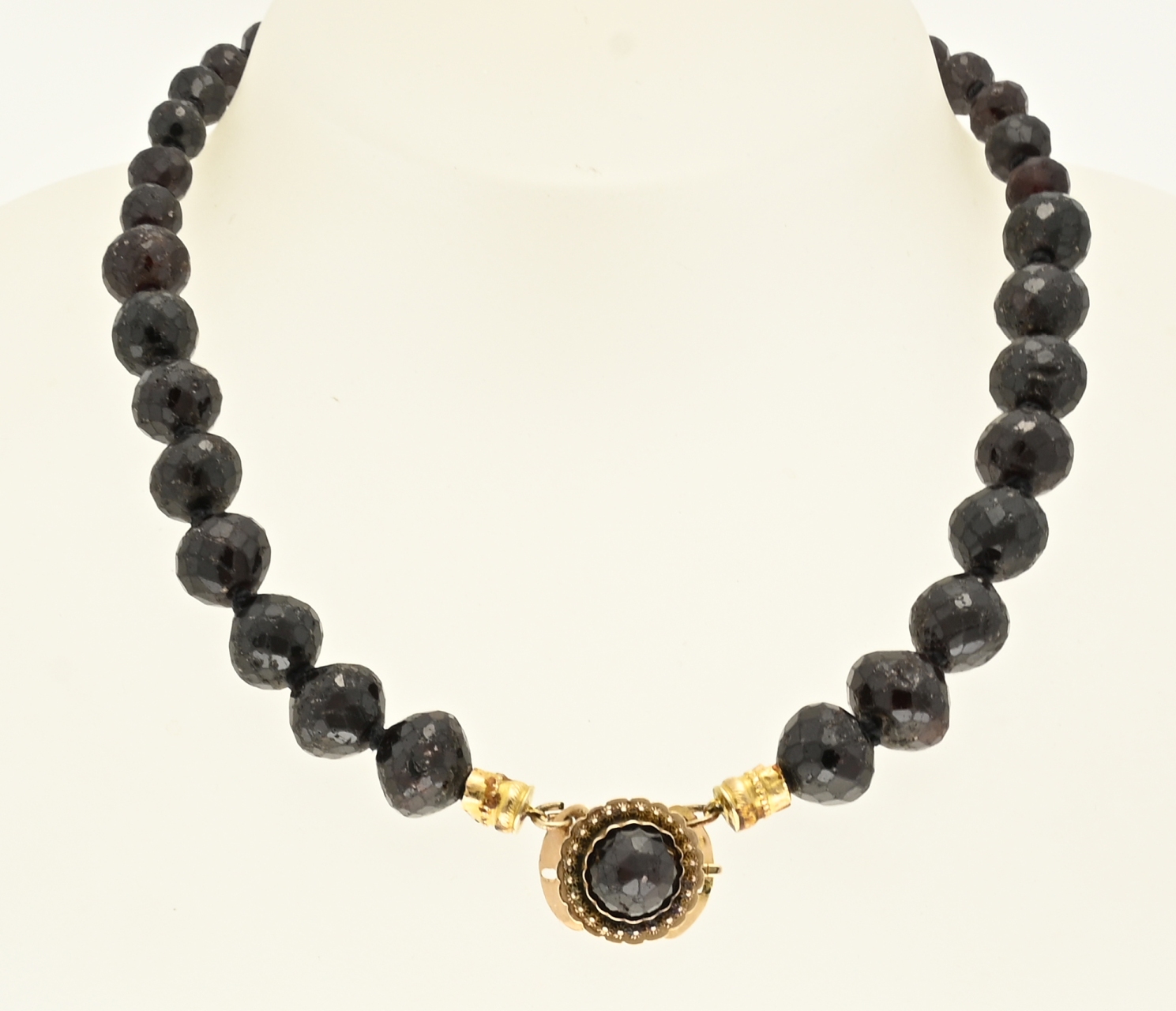 Garnet necklace with a gold clasp