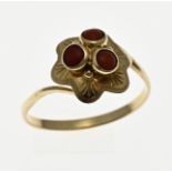 Gold ring with red coral