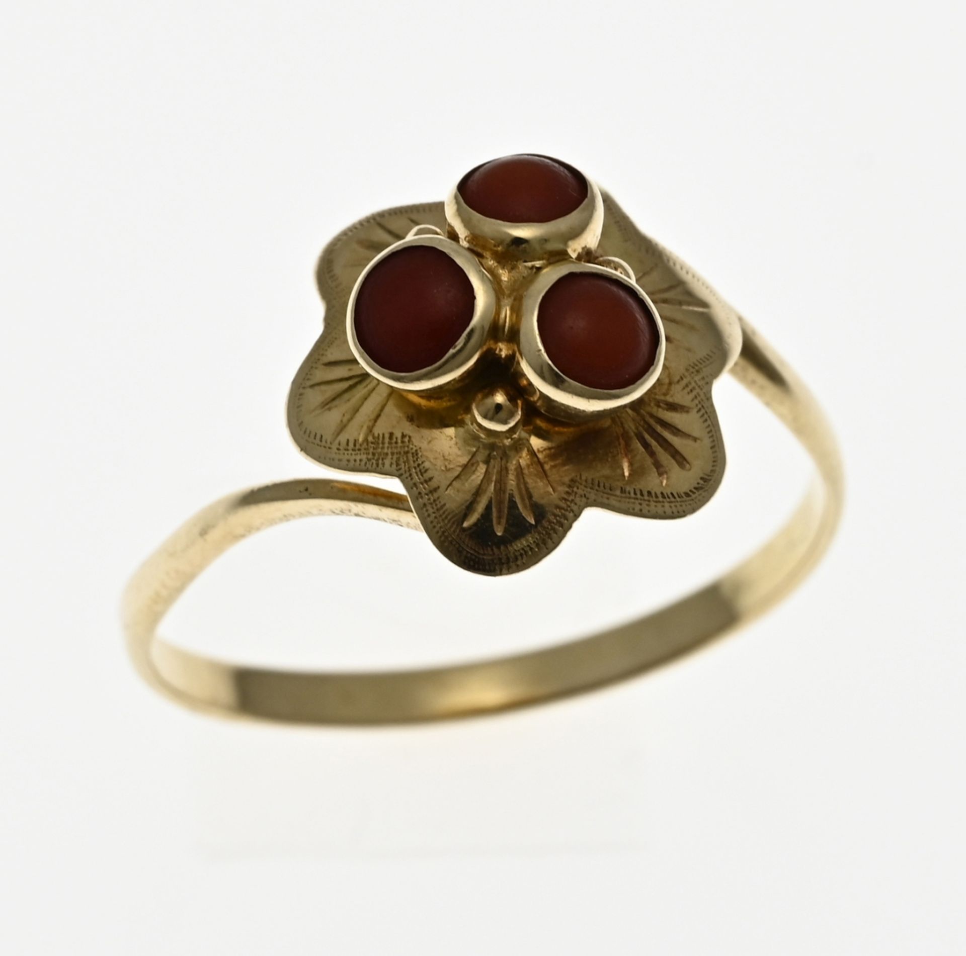 Gold ring with red coral