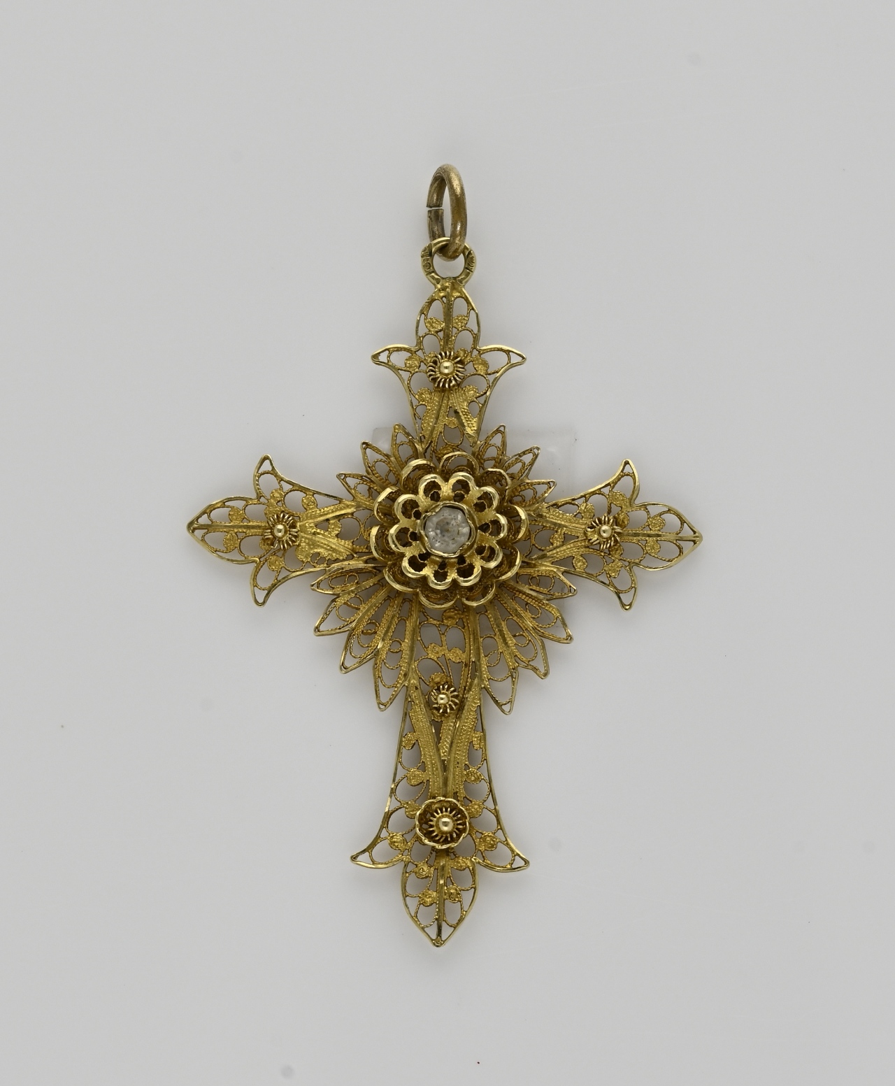 Golden cross with filigree