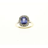 Gold ring with sapphire