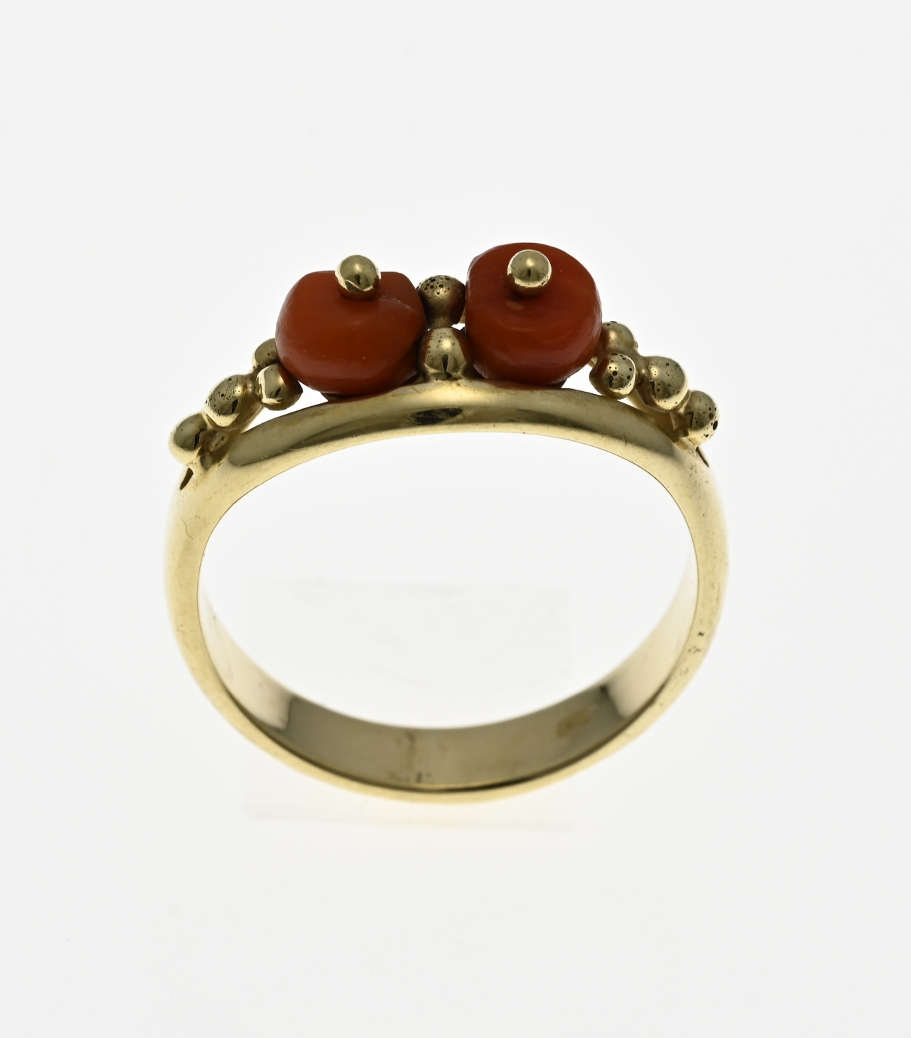 Gold ring with red coral