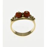 Gold ring with red coral