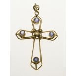 Gold cross pendant with tanzanite