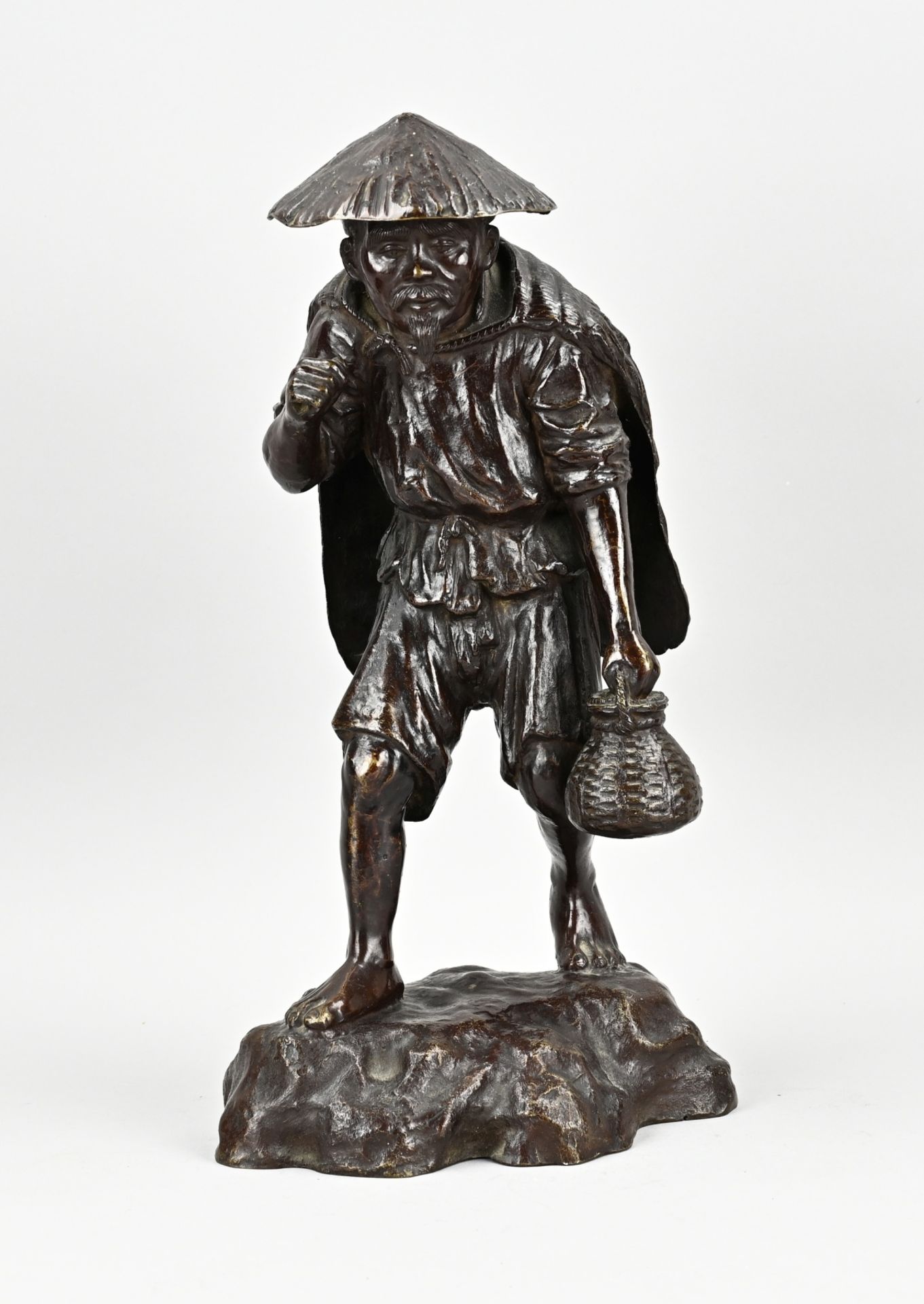 Bronze statue, Man with basket