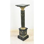 Marble column with bronze