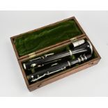 Antique clarinet in case