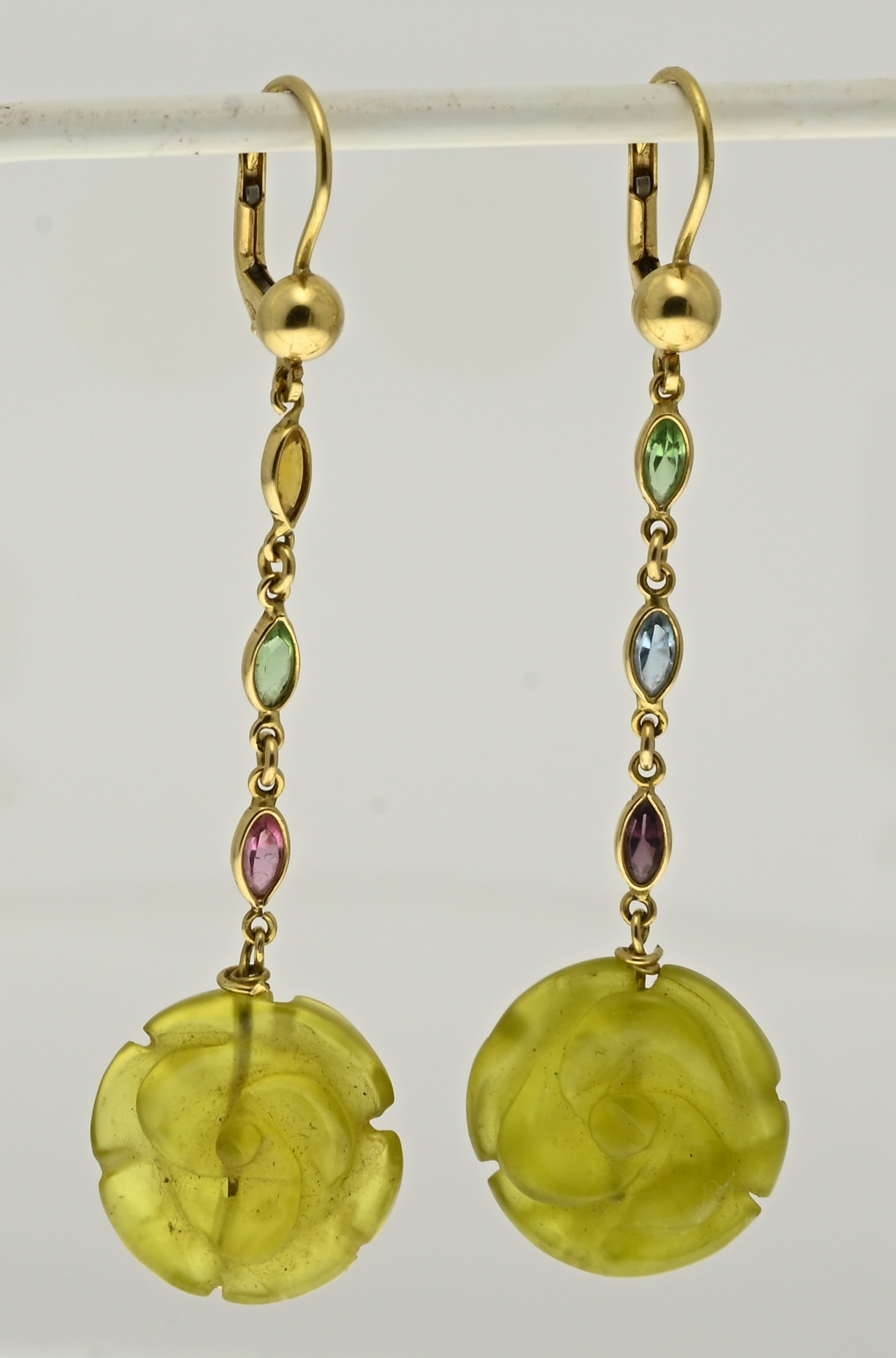 Gold earrings with colored stones