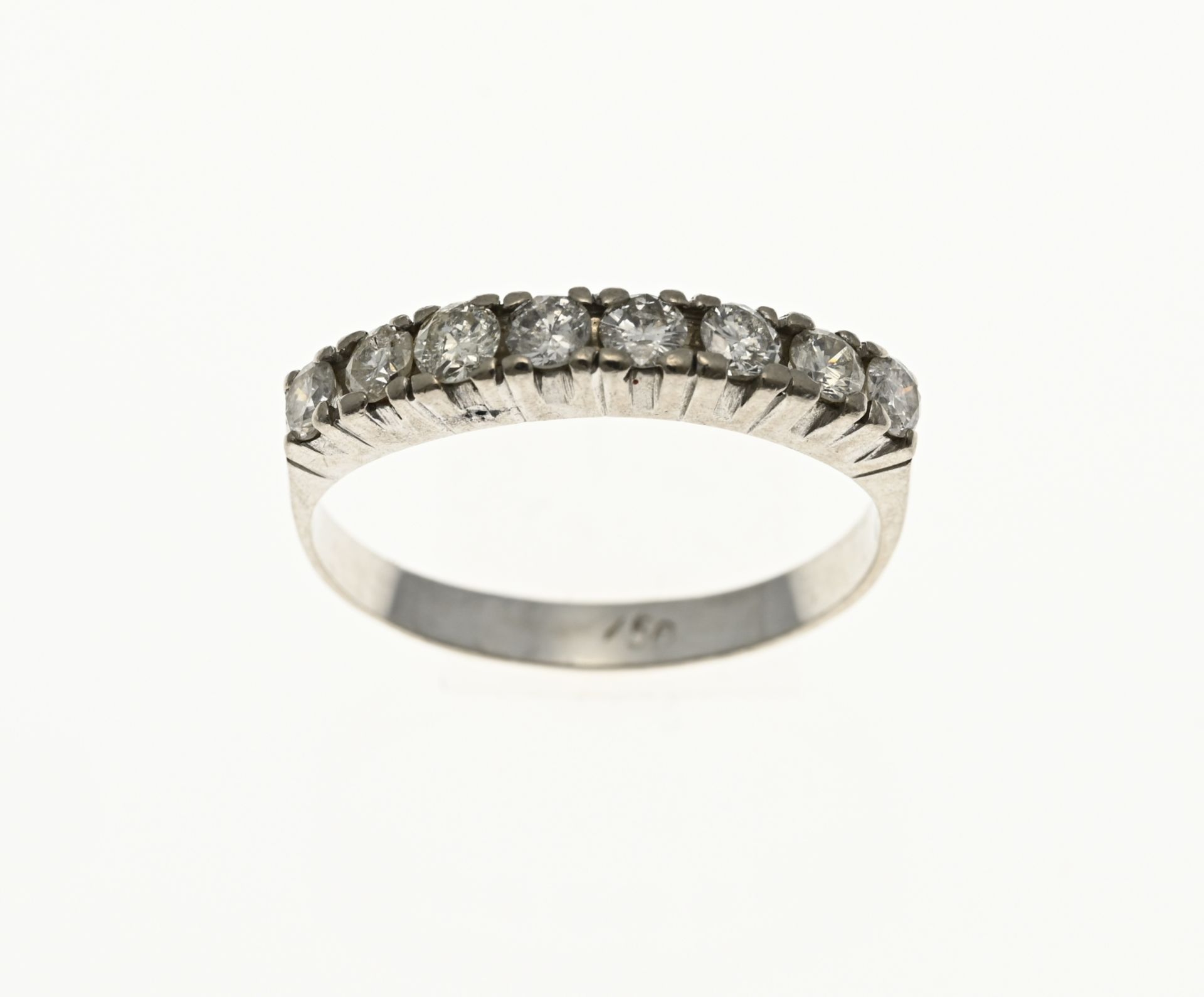 White gold row ring with diamond