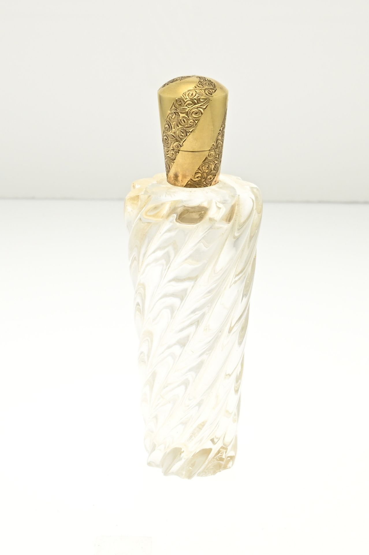 Odeur bottle with gold