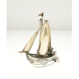 Silver miniature sailboat