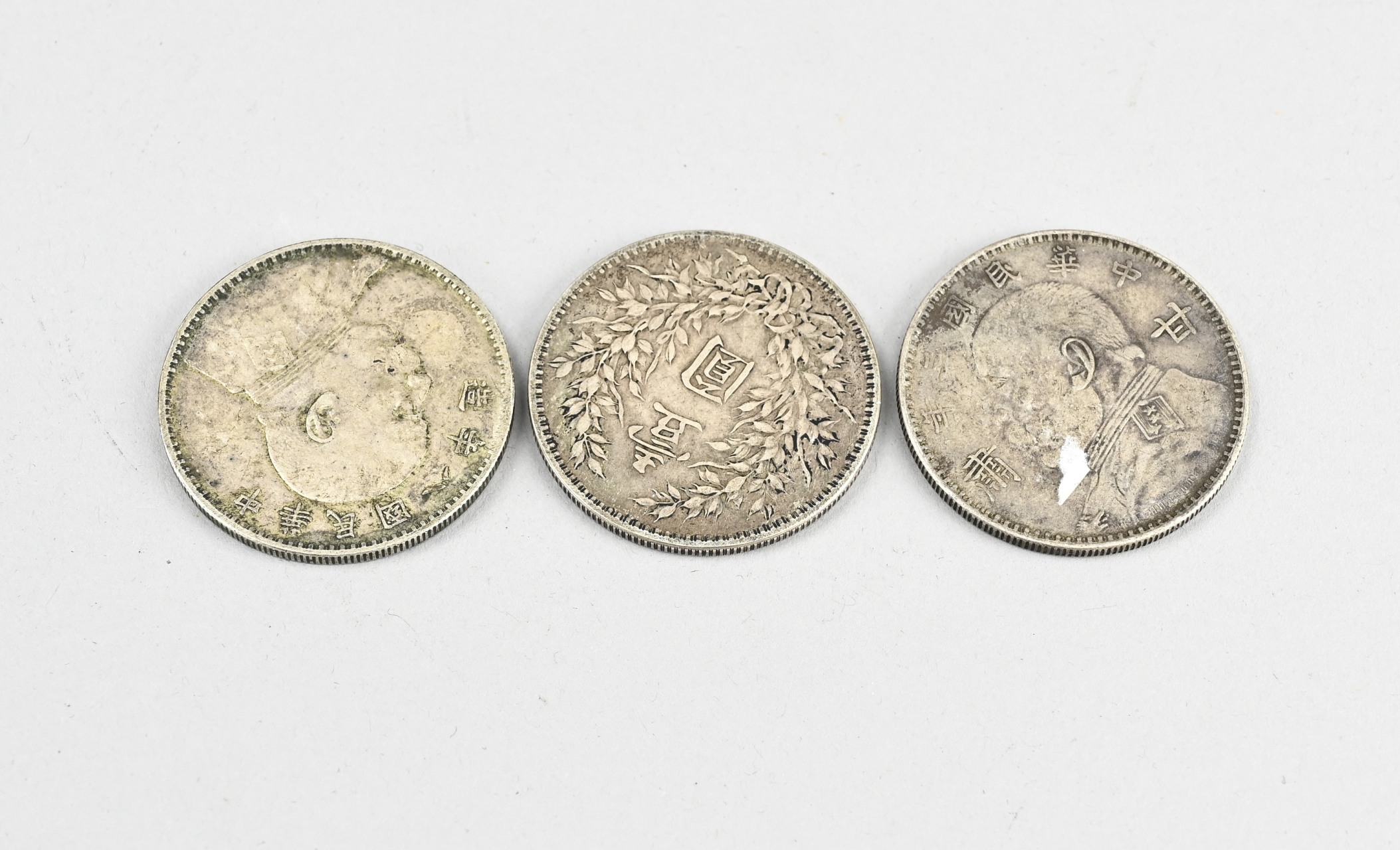 Three Chinese coins Ã˜ 3.8 cm.