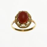 Gold ring with red coral