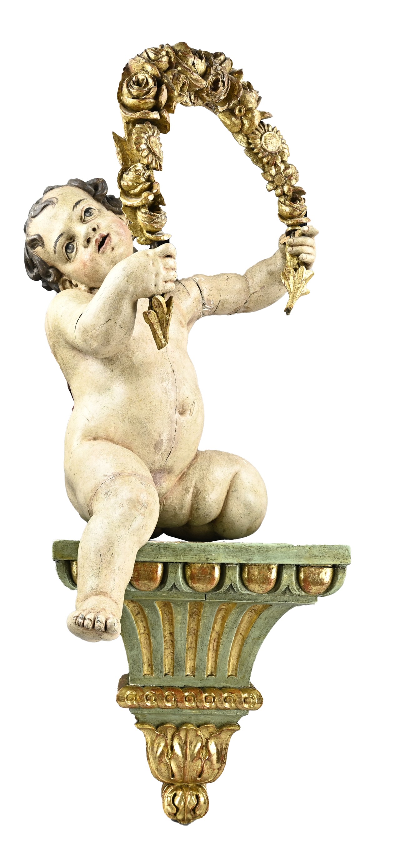 Antique cupid on console