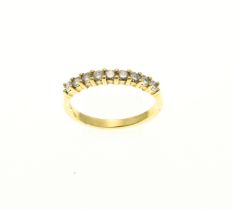 Yellow gold row ring with diamond