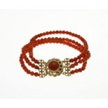 Bracelet with 3 rows of red coral