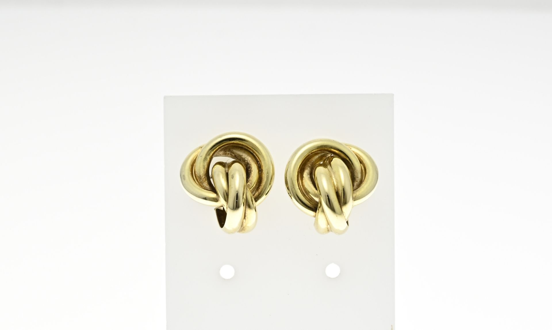 Gold stud earrings