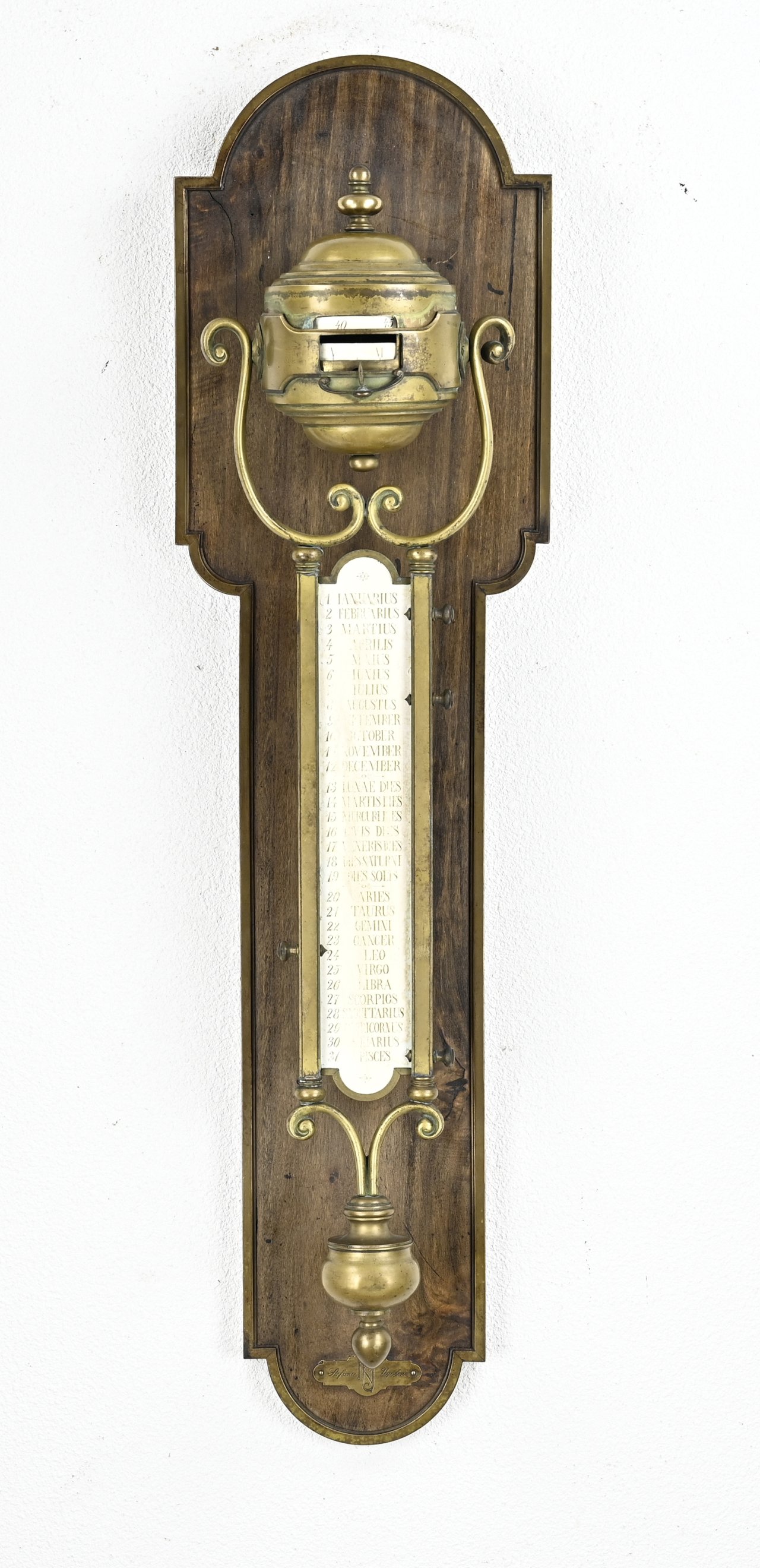 Wall clock with barometer