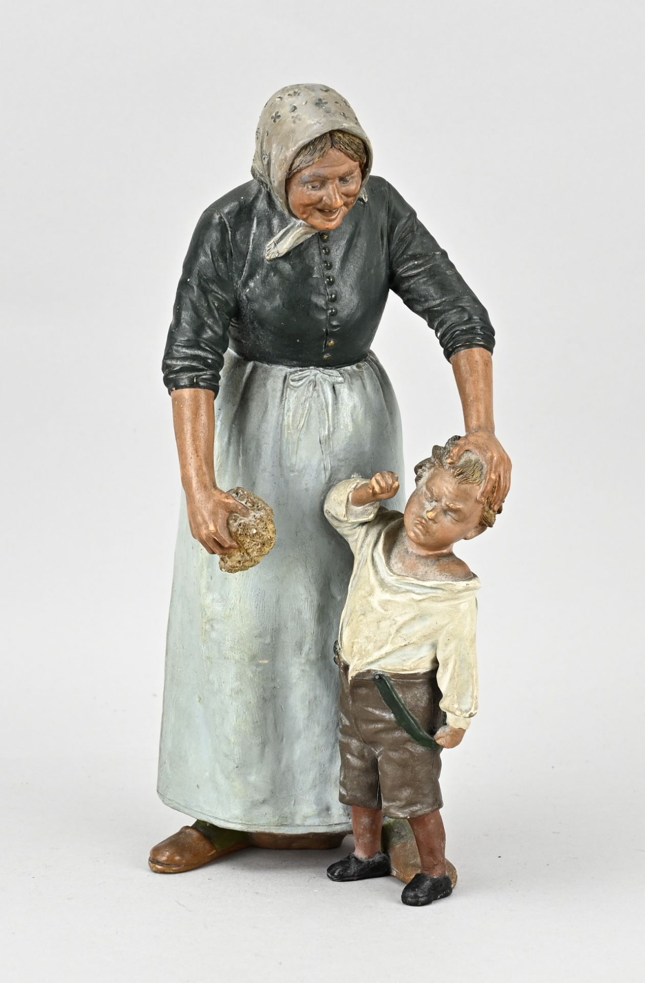 Terracotta statue, Mother washing child
