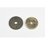 Two Chinese coins Ã˜ 4.2 - 4.7 cm.