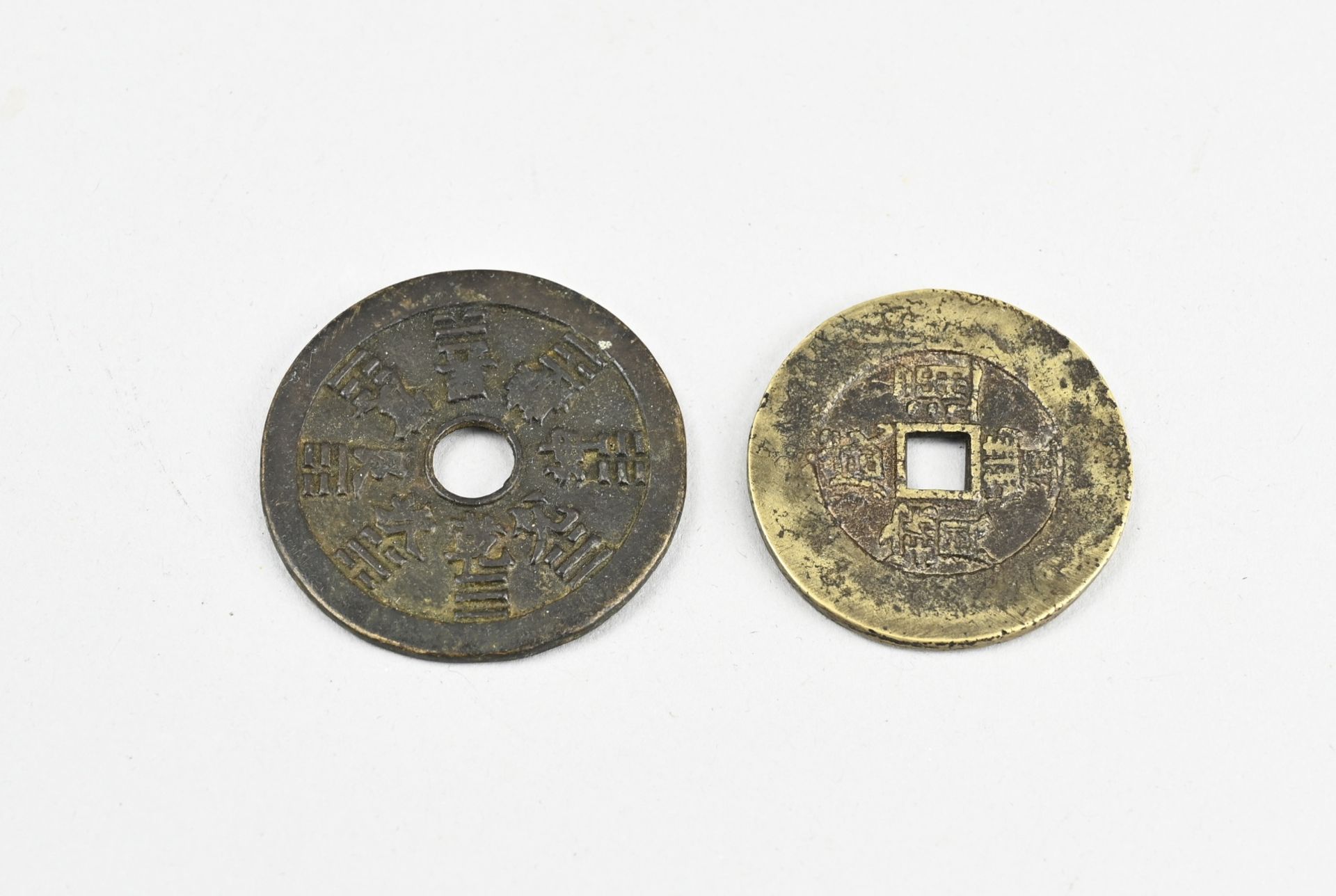Two Chinese coins Ã˜ 4.2 - 4.7 cm.